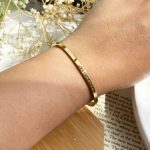دستبند پشت ساعتی طرح Daniel Wellington استیل نقره ای/طلایی