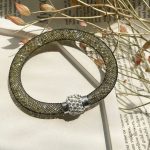دستبند Stardust طرح سواروفسکی سفید/مشکی/طلایی