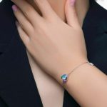 دستبند قلب سوارفسکی آبی بنفش و آویز پروانه جواهری نقره