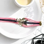 دستبند ایفل Love بی نهایت برنزی