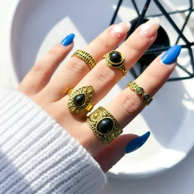 پک انگشتر پهن رزین مشکی طلایی