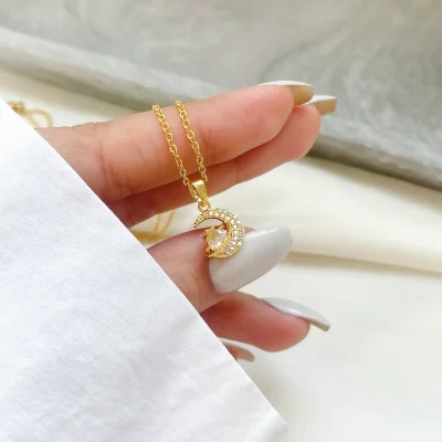 گردنبند ماه و زحل جواهری استیل
