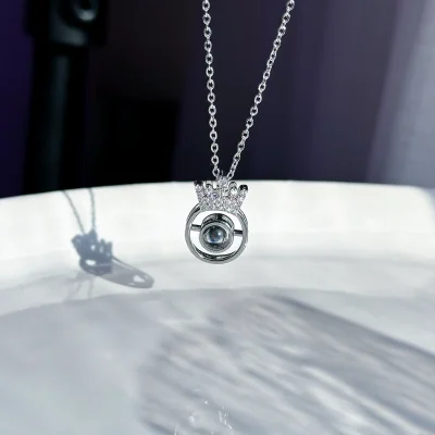 گردنبند تاج دوست دارم به 100 زبان استیل