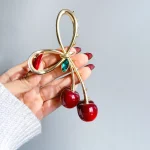 گیره مو گیلاس مینیمال گیره مو گیلاس آبنباتی قرمز گیره مو گیلاس طلایی گیره مو گیلاس قرمز آبنباتی نقره ای