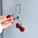 گیره مو گیلاس مینیمال گیره مو گیلاس آبنباتی قرمز گیره مو گیلاس طلایی گیره مو گیلاس قرمز آبنباتی نقره ای