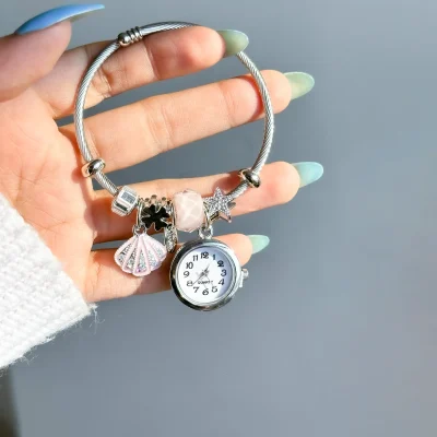 بنگل پاندورا صدف ستاره ساعت النگو ساعت دار صدف ستاره استیل بنگل ساعت دار ستاره و صدف فری سایز دستبند ساعت ستاره و صدف آبی آبکاری نقره