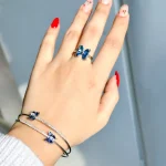 بنگل پروانه تنیسی جواهری فری سایز النگو پروانه تنیسی آبی بنگل پروانه تنیسی جواهری کریستال سفید