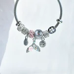 دستبند پاندورا دم وال بابونه صورتی کریستال زیرکونیا صورتی آبکاری نقره 925