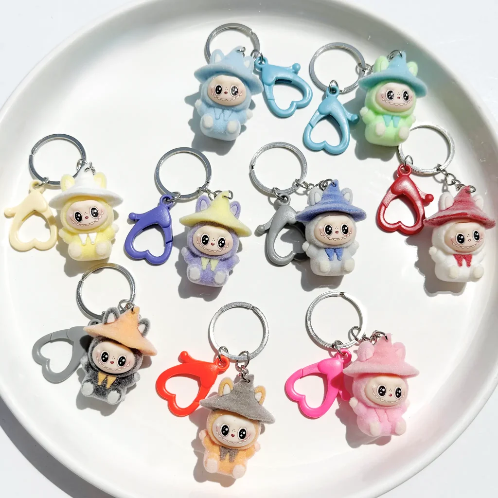 جاسویچی و چارم بگ لبوبو مینی کلاه دار صورتی لبوبو صورتی باربی لبوبو زرد کره ای ذغالی جاسوئیچی لبوبو نارنجی جاسوییچی لبوبو فیروزه ای