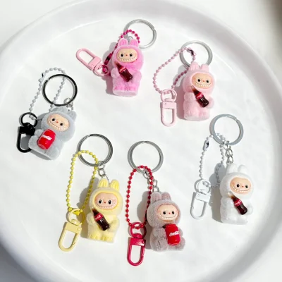 جاسویچی و چارم بگ لبوبو مینی کلاه دار صورتی لبوبو صورتی باربی لبوبو زرد کره ای ذغالی جاسوئیچی لبوبو نارنجی جاسوییچی لبوبو جاسویچی و چارم بگ لبوبو کوکاکولا