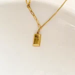 گردنبند طرح شمش طلا استیل