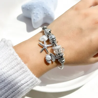 دستبند پاندورا صدف قلب بابونه ستاره دریایی